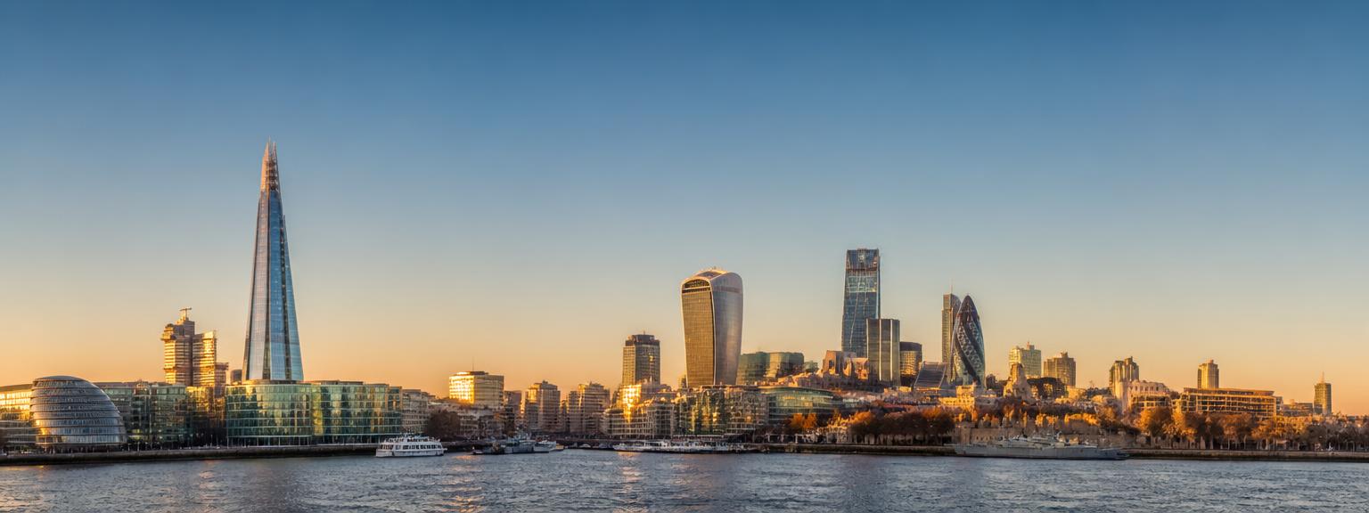 London skyline along the River Thames at golden hour